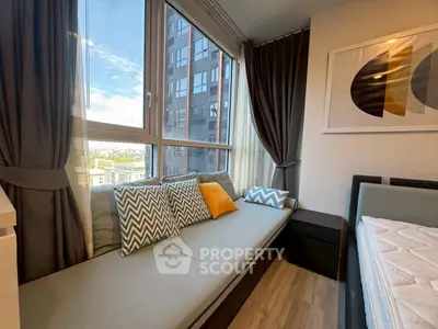 Modern bedroom with large windows and stylish decor in urban apartment