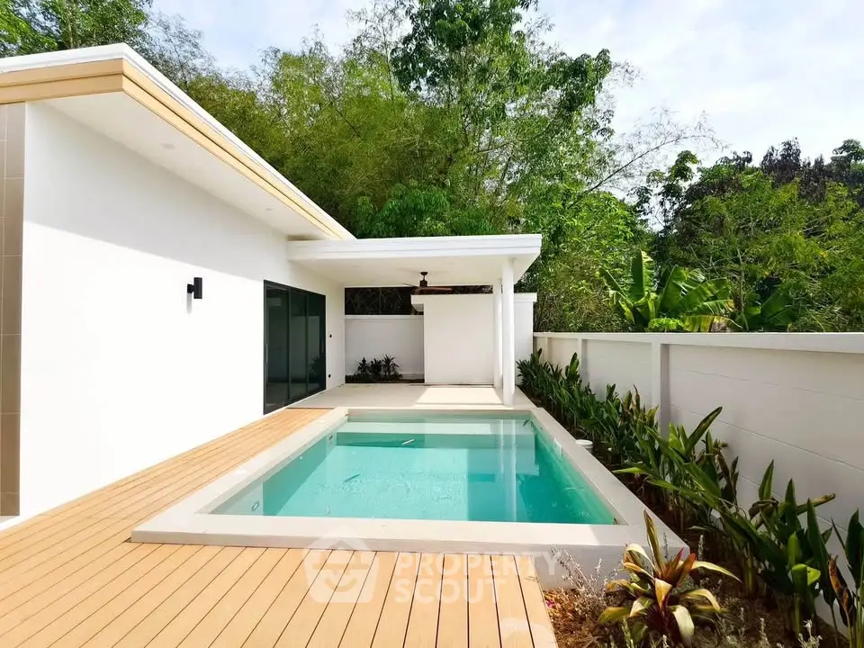 Modern home with private pool and lush garden, perfect for relaxation and entertaining.