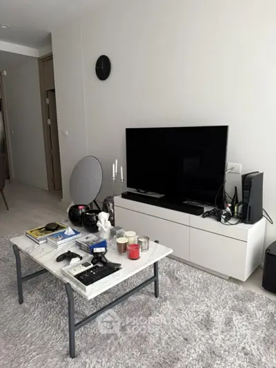 Modern living room with sleek TV setup and stylish decor