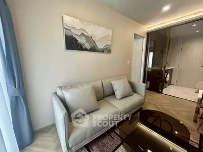 Modern living room with stylish sofa and elegant decor in a contemporary apartment.