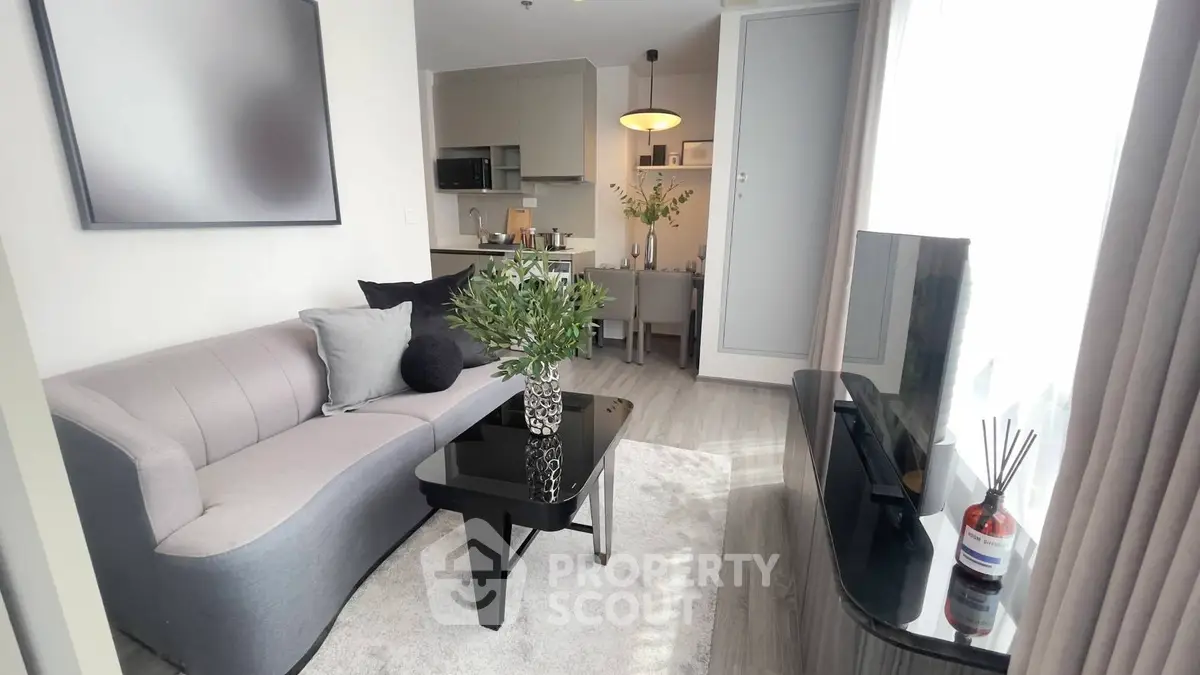 Modern living room with sleek furniture and natural light