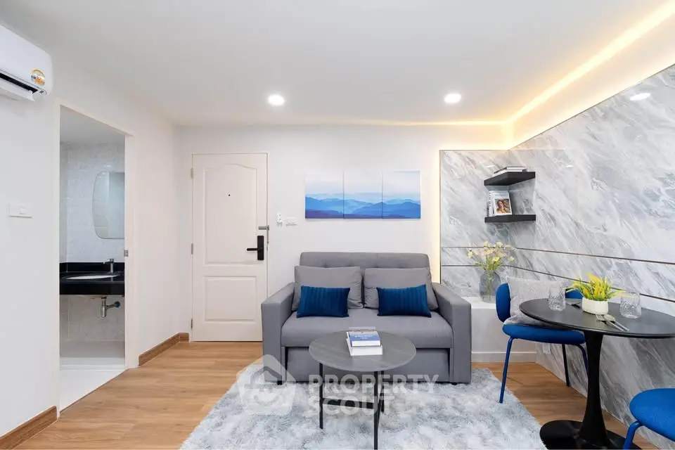 Modern living room with stylish decor and cozy seating area