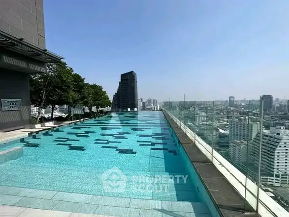 Stunning rooftop infinity pool with panoramic city skyline views