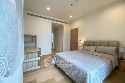 Modern bedroom with stylish decor and natural light