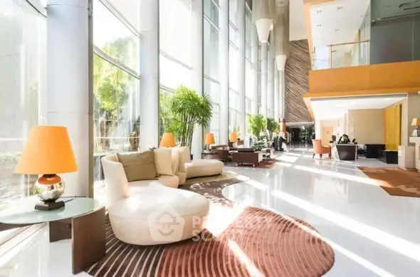 Luxurious modern living room with large windows and elegant furniture