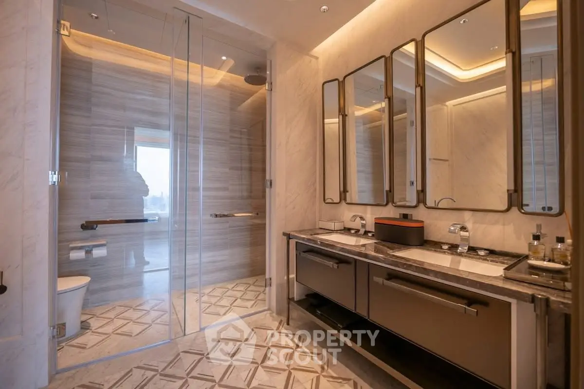 Luxurious modern bathroom with elegant design and spacious shower area