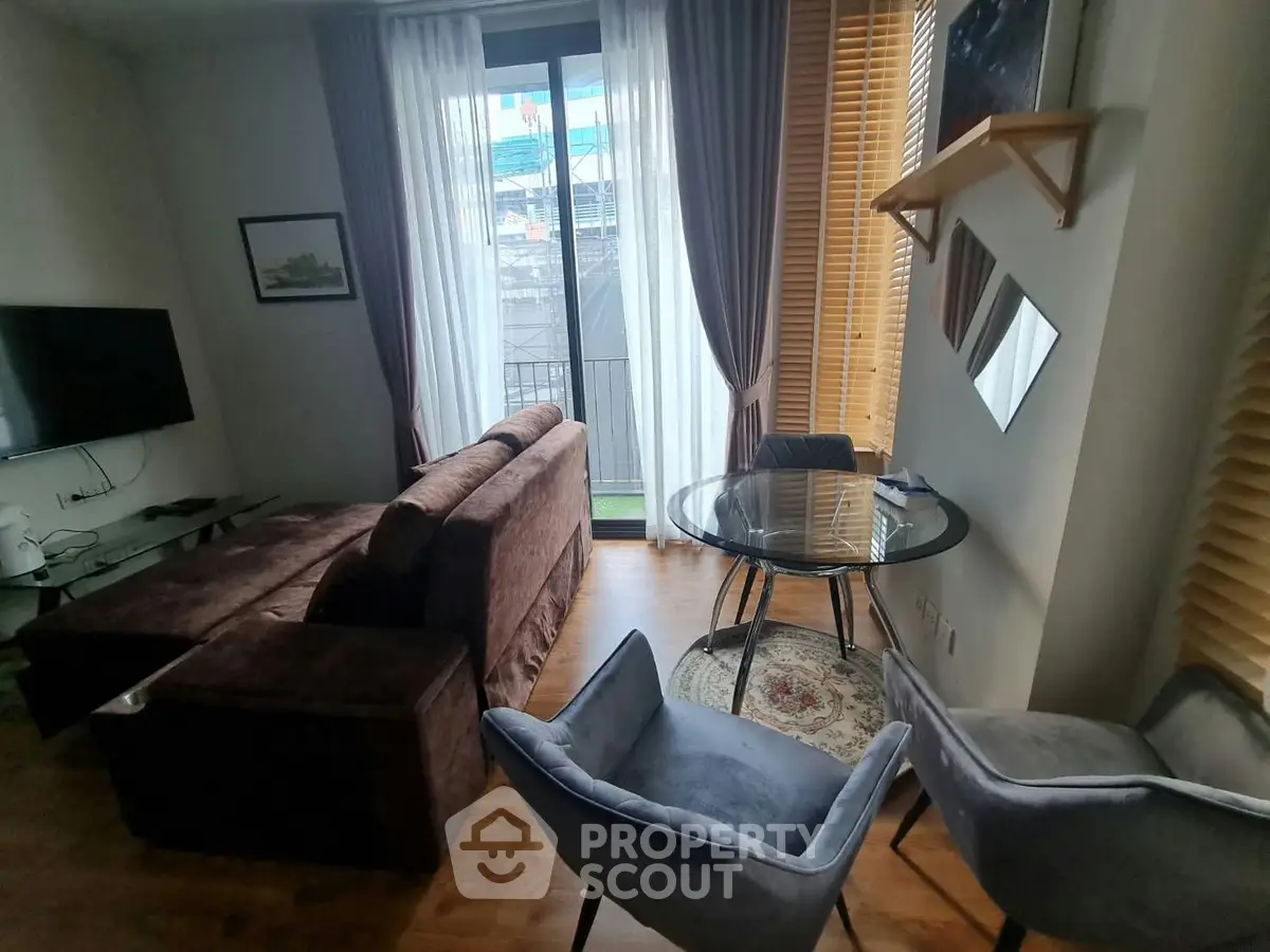 Cozy living room with modern furniture and large window view