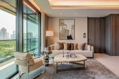 Luxurious living room with modern decor and stunning city view from large windows.