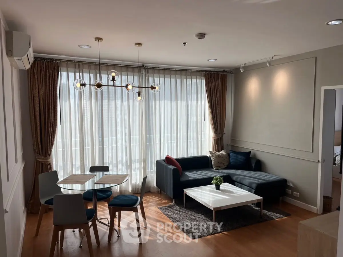 Stylish modern living room with elegant furniture and natural light