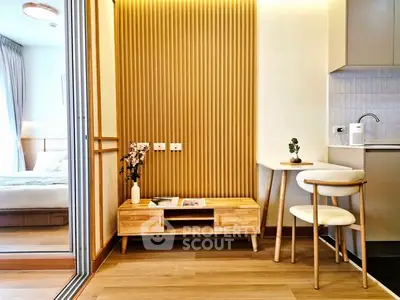 Modern apartment interior with stylish wooden furniture and cozy decor