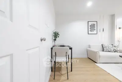 Modern minimalist living room with sleek furniture and stylish decor
