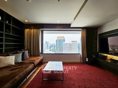Luxurious living room with stunning city view, modern furniture, and elegant decor.