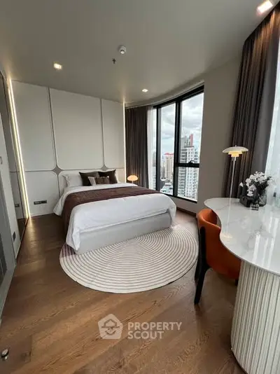 Luxurious bedroom with panoramic city views and modern decor