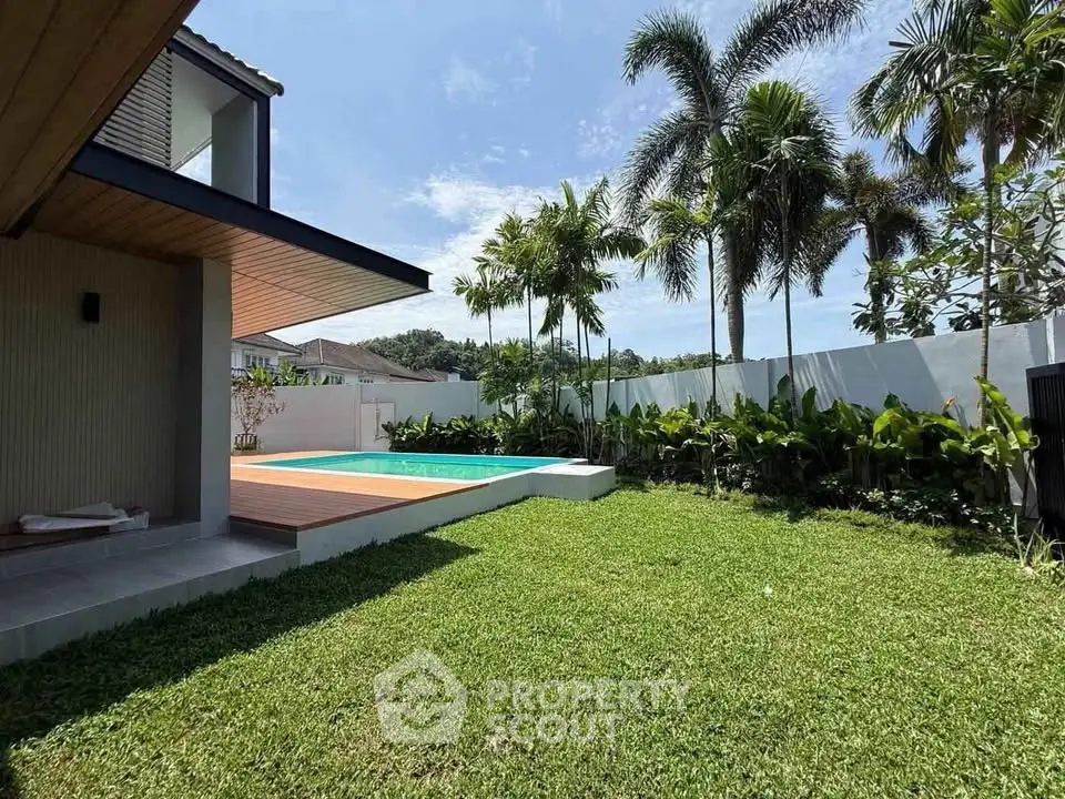 Luxurious modern home with private pool and lush garden, perfect for relaxation and entertaining.