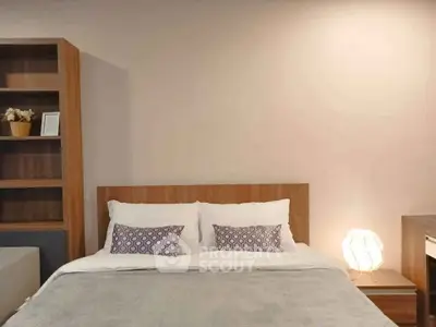 Cozy bedroom with modern wooden furniture and soft lighting, perfect for relaxation.
