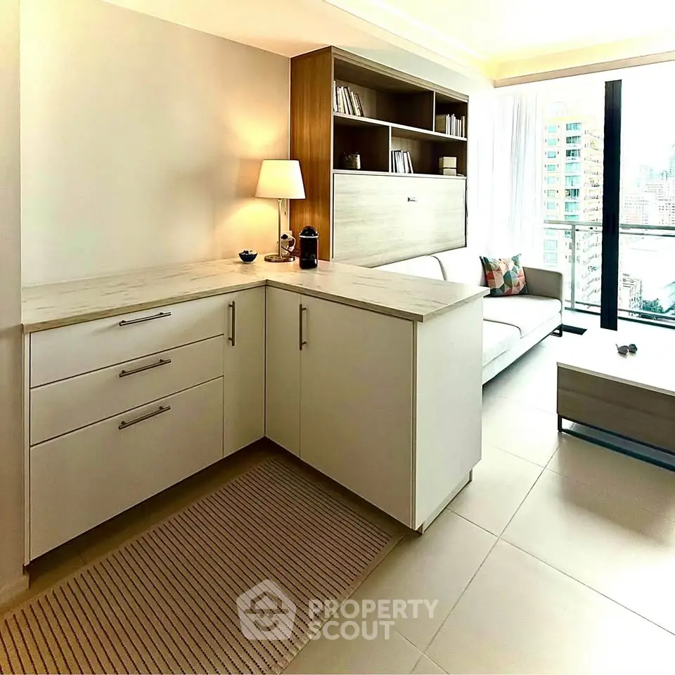 Modern living room with sleek furniture and city view, featuring a cozy reading nook and stylish decor.