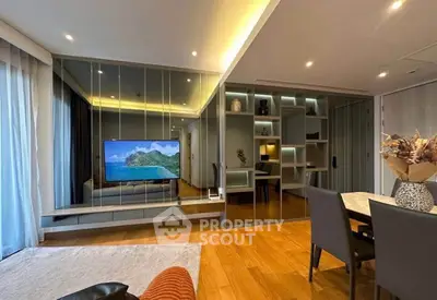 Modern living room with mirrored wall and stylish dining area