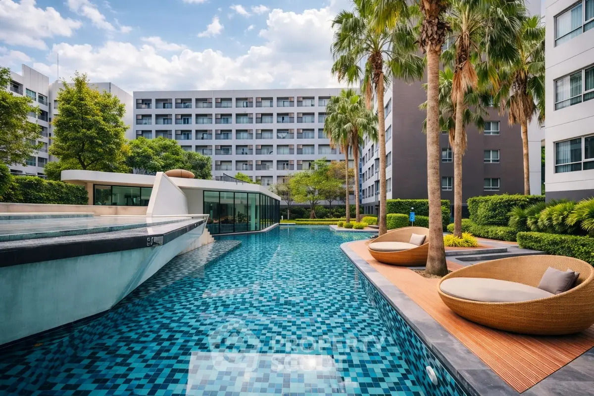 Luxurious apartment complex with stunning pool and modern architecture