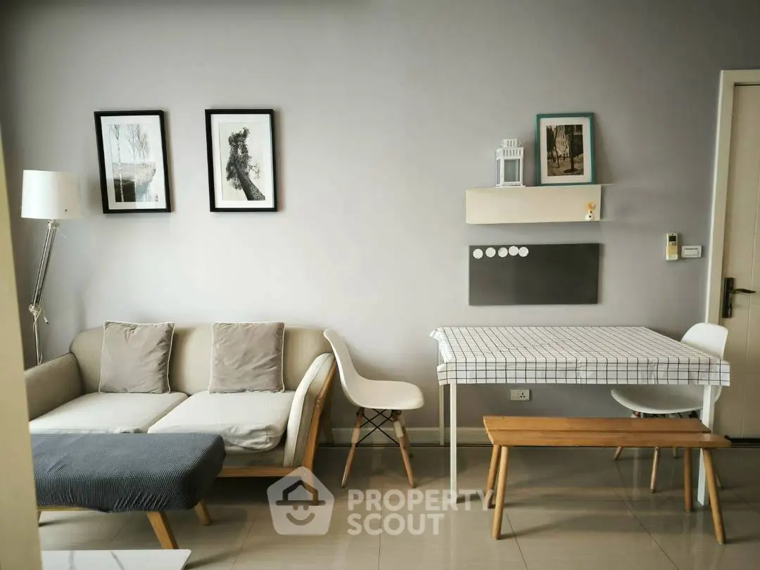 Chic modern living room with stylish decor and cozy seating area.