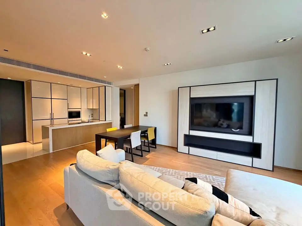 Spacious modern living room with open kitchen and stylish furniture