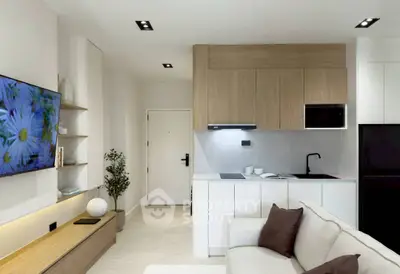 Modern open-plan living room with sleek kitchen and stylish decor