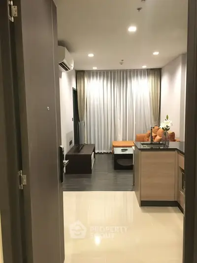 Modern living room with stylish furniture and open layout, perfect for urban living.