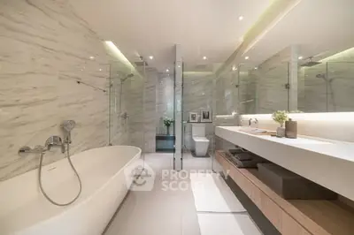 Luxurious modern bathroom with elegant marble walls and spacious bathtub