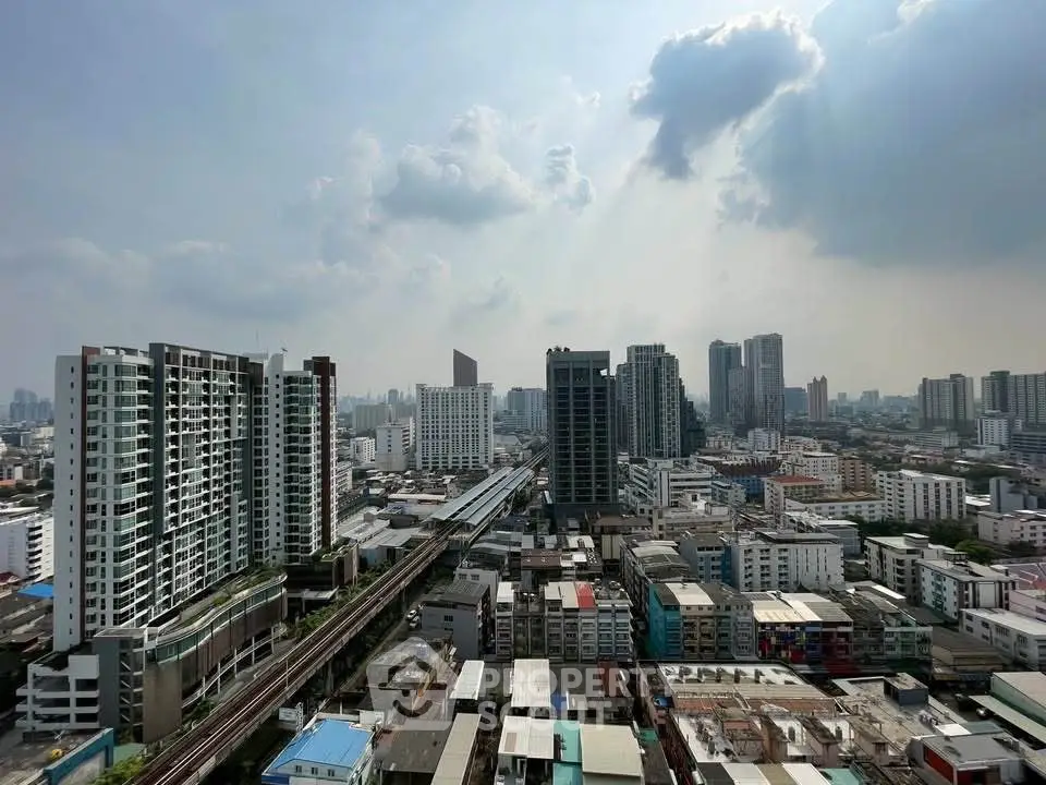 Stunning cityscape view from high-rise building showcasing urban skyline and modern architecture.