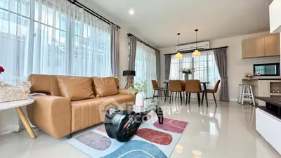 Spacious modern living room with elegant decor and natural light