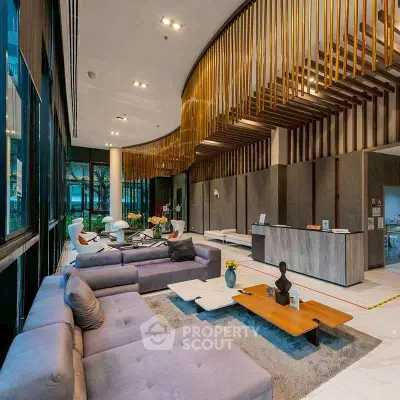 Luxurious modern living room with elegant decor and spacious seating area.