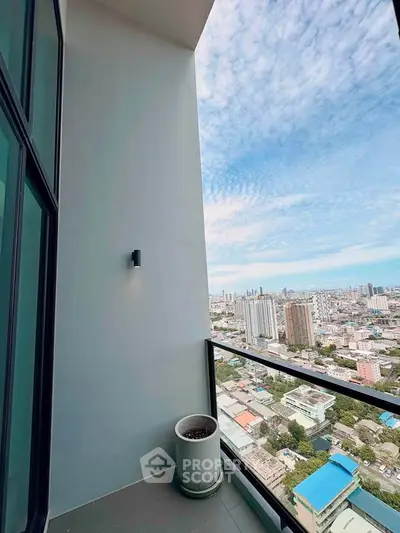 Stunning cityscape view from a modern high-rise balcony, perfect for urban living enthusiasts.