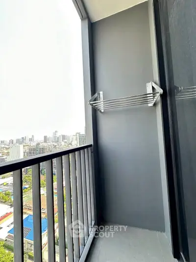 Modern balcony with city view and sleek railing design