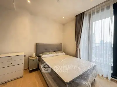 Modern bedroom with city view and elegant decor