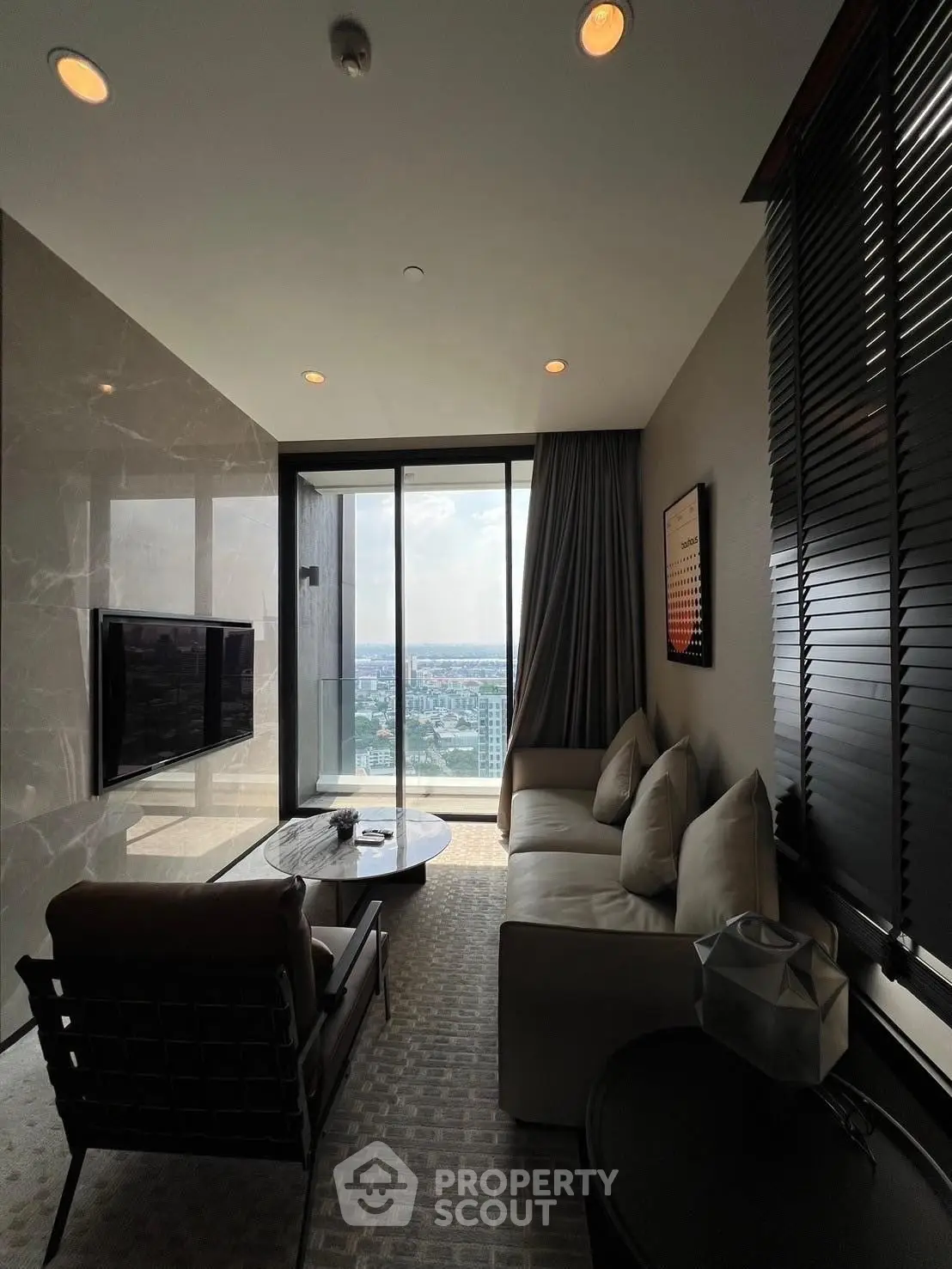 Luxurious living room with stunning city view and modern furnishings