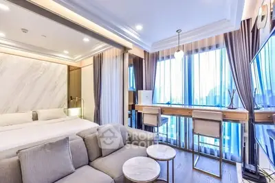 Luxurious modern bedroom with city view and stylish decor