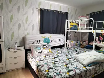 Charming children's bedroom with playful decor and bunk bed