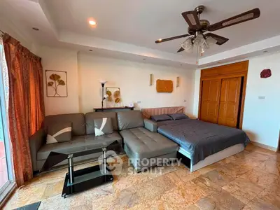 Spacious living room with modern decor and cozy seating area