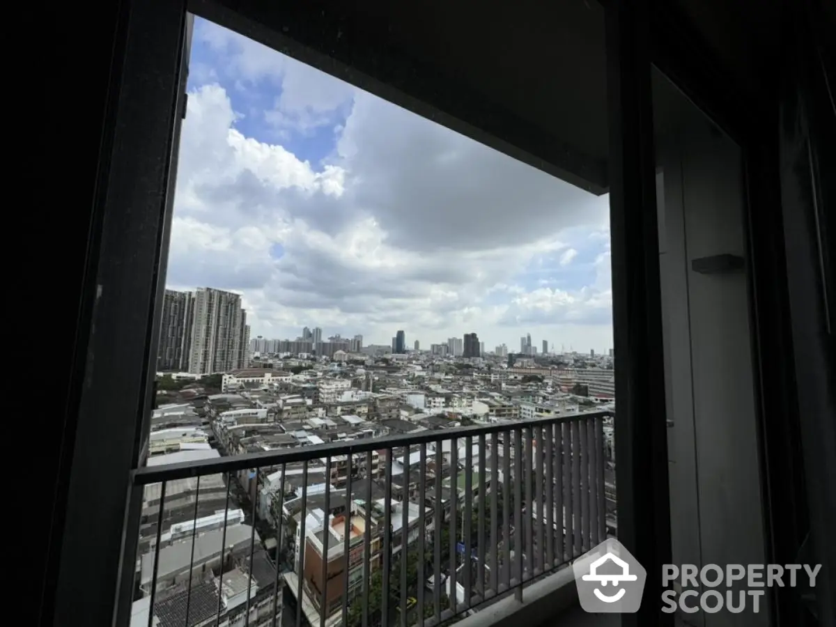 Stunning cityscape view from high-rise balcony with expansive skyline and urban landscape.