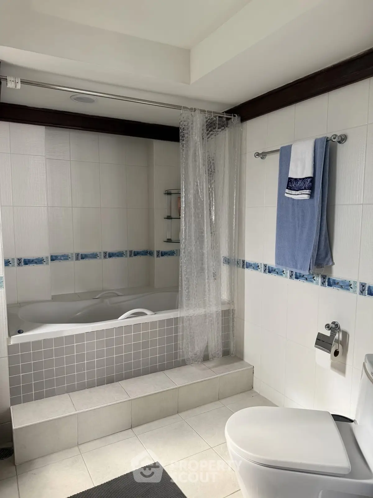 Modern bathroom with bathtub and elegant tile design