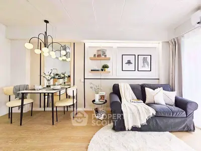 Stylish modern living room with elegant dining area and cozy sofa.