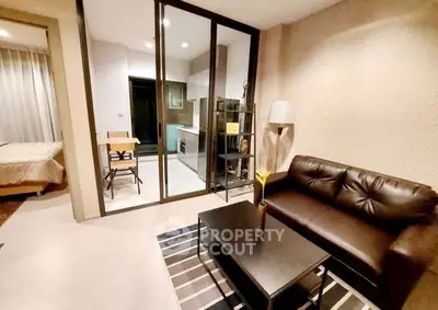 Modern apartment living room with sleek leather sofa and stylish decor