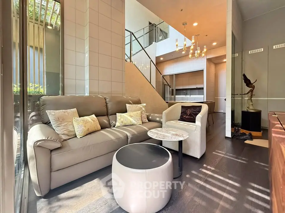 Luxurious modern living room with elegant decor and natural light