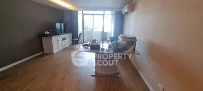 Spacious living room with wooden flooring and modern decor