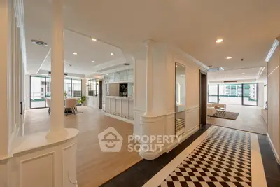 Luxurious open-plan living space with elegant dining area and stylish flooring