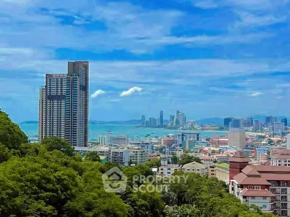 Stunning cityscape view with high-rise buildings and lush greenery, perfect for urban living.