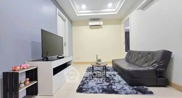 Modern living room with sleek furniture and stylish decor