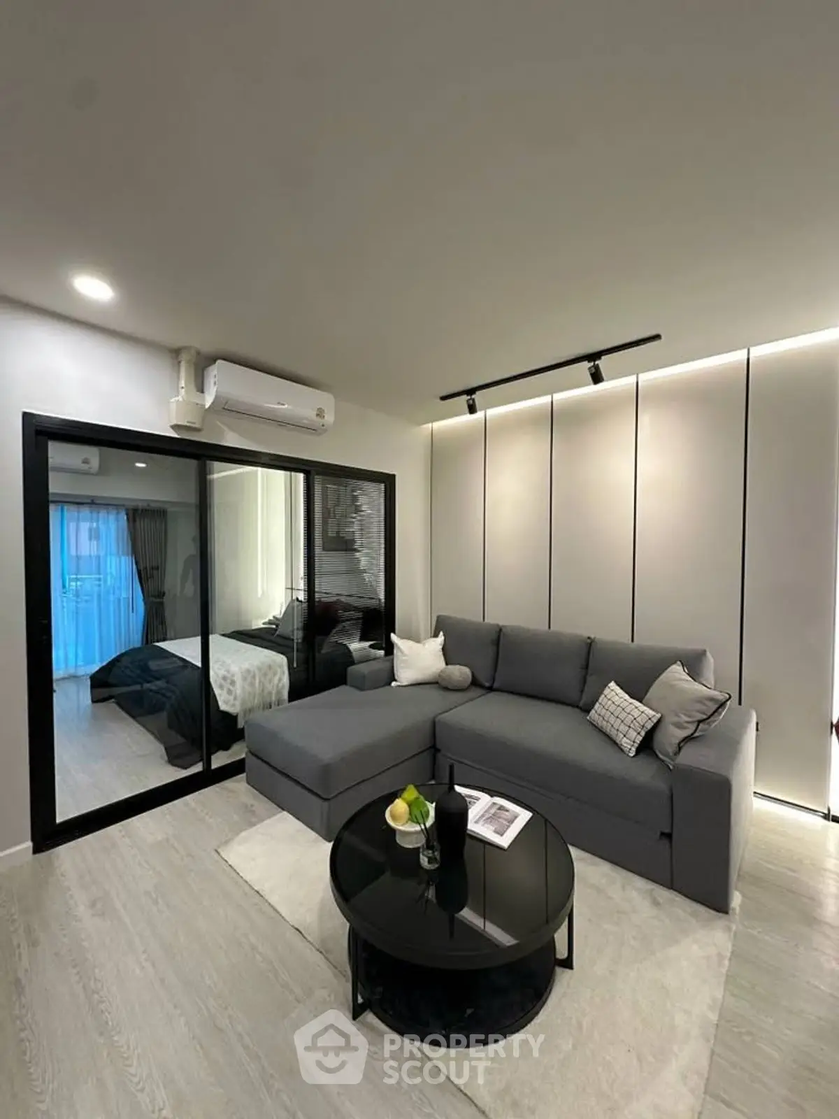 Modern living room with sleek design and cozy sectional sofa