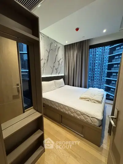 Modern bedroom with city view and stylish decor