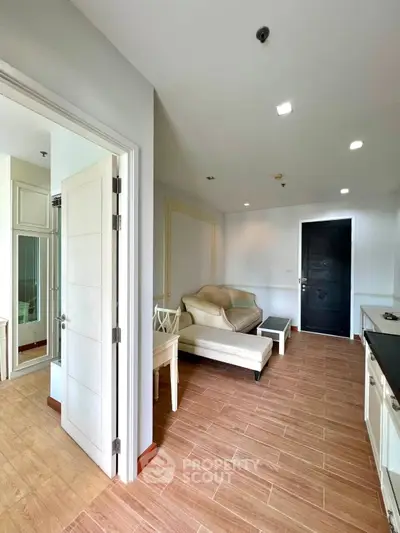 Modern living room with open layout and stylish furniture in a contemporary apartment.