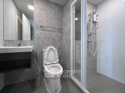 Modern bathroom with sleek design and shower enclosure